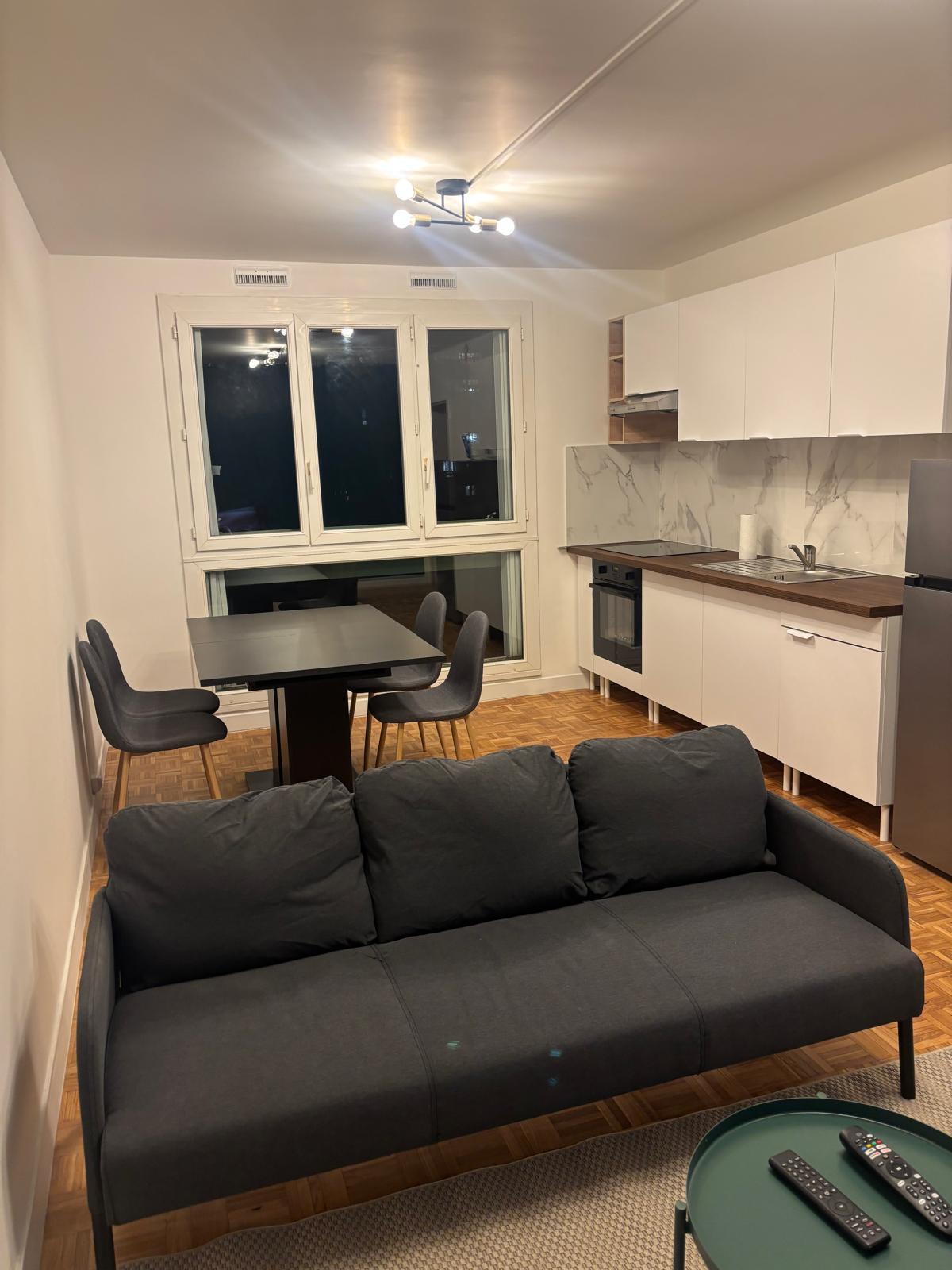 Après transformation - Salon et cuisine ouverte Champigny